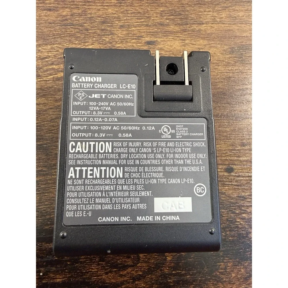 Canon LC-E10 Battery Charger Genuine OEM + Canon Sure Shot Tele‎ Max Manual 1991